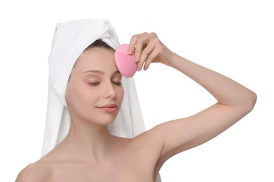 Photo of Washing face. Young woman with cleansing brush on white background