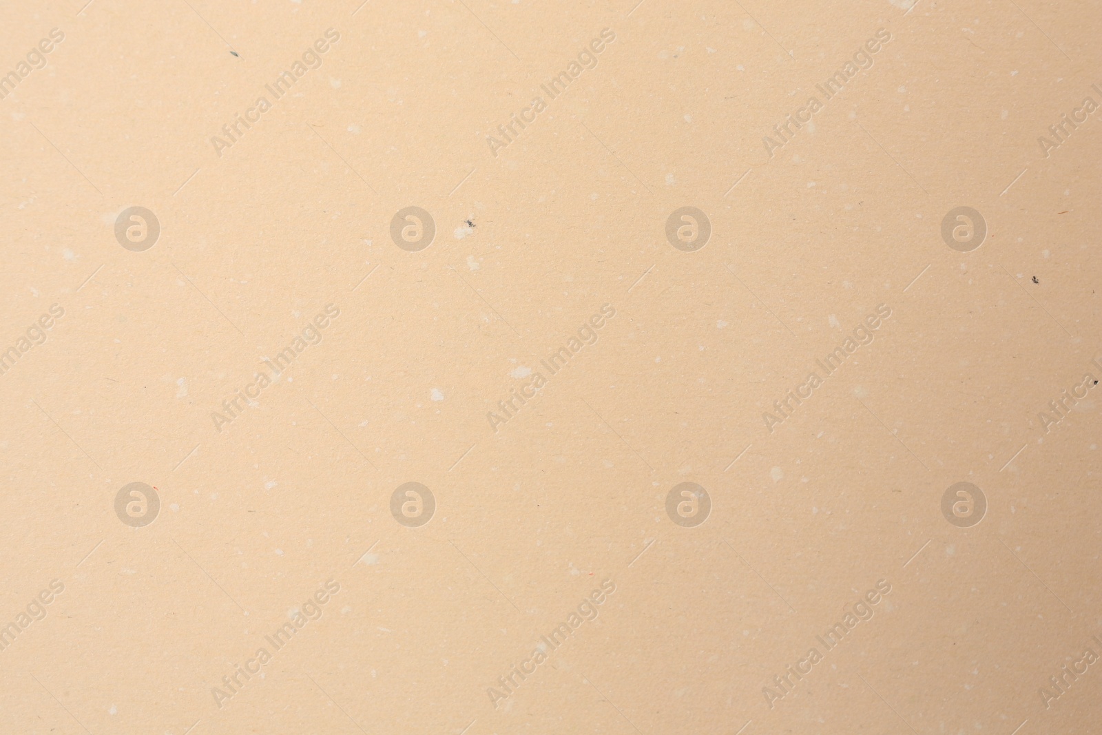 Photo of Texture of beige paper sheet as background, top view