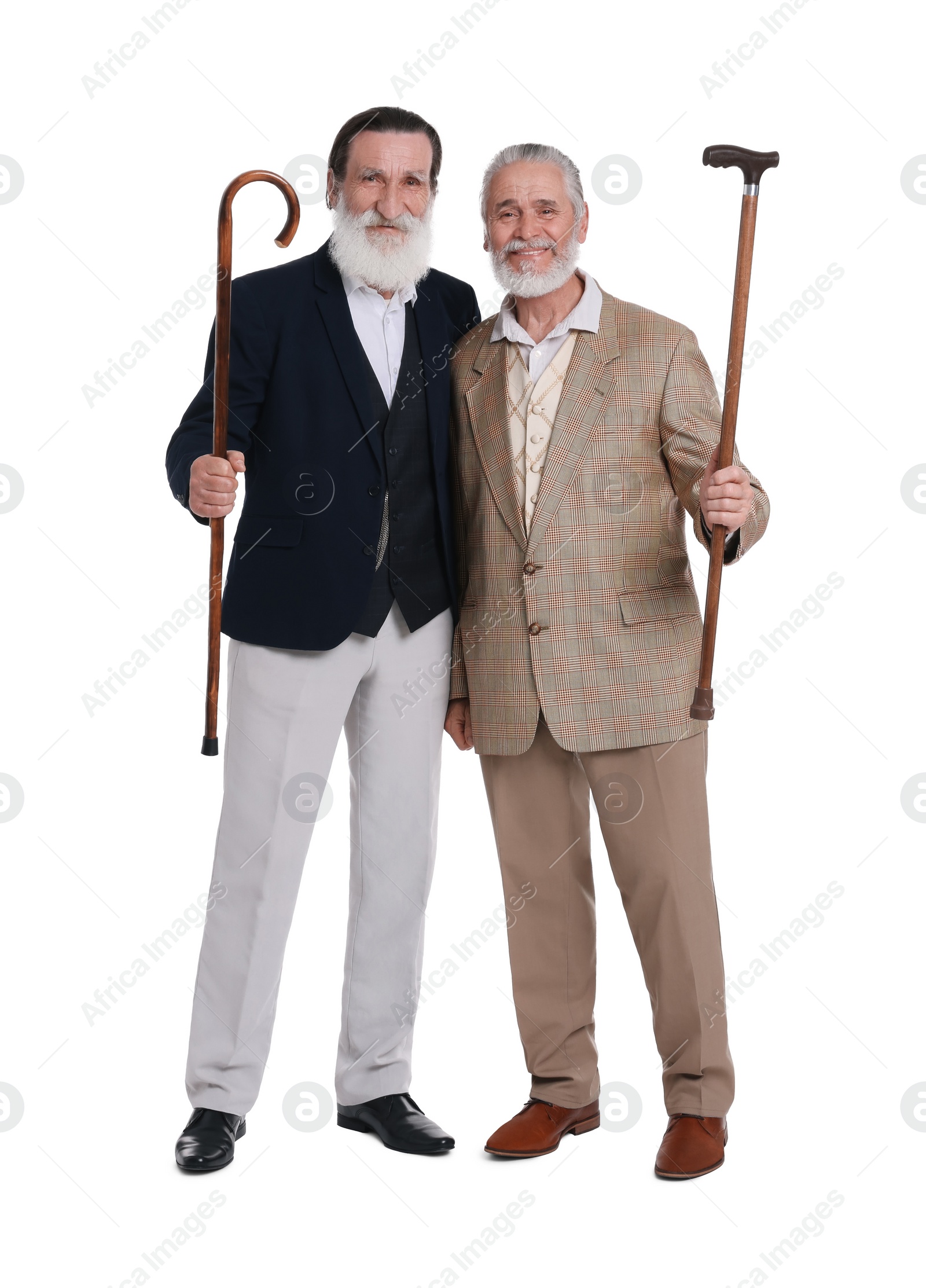 Photo of Senior men with walking canes on white background