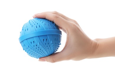 Woman holding blue dryer ball for washing machine isolated on white, closeup