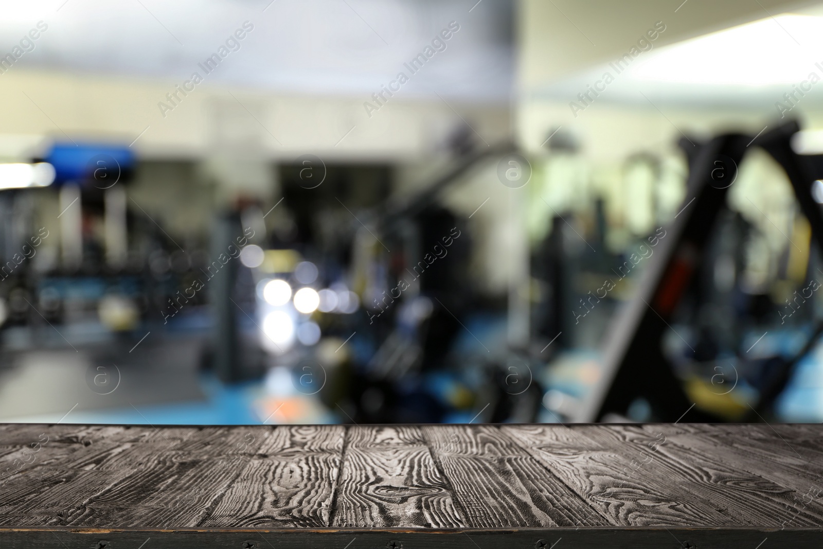 Image of Empty wooden surface in modern gym interior