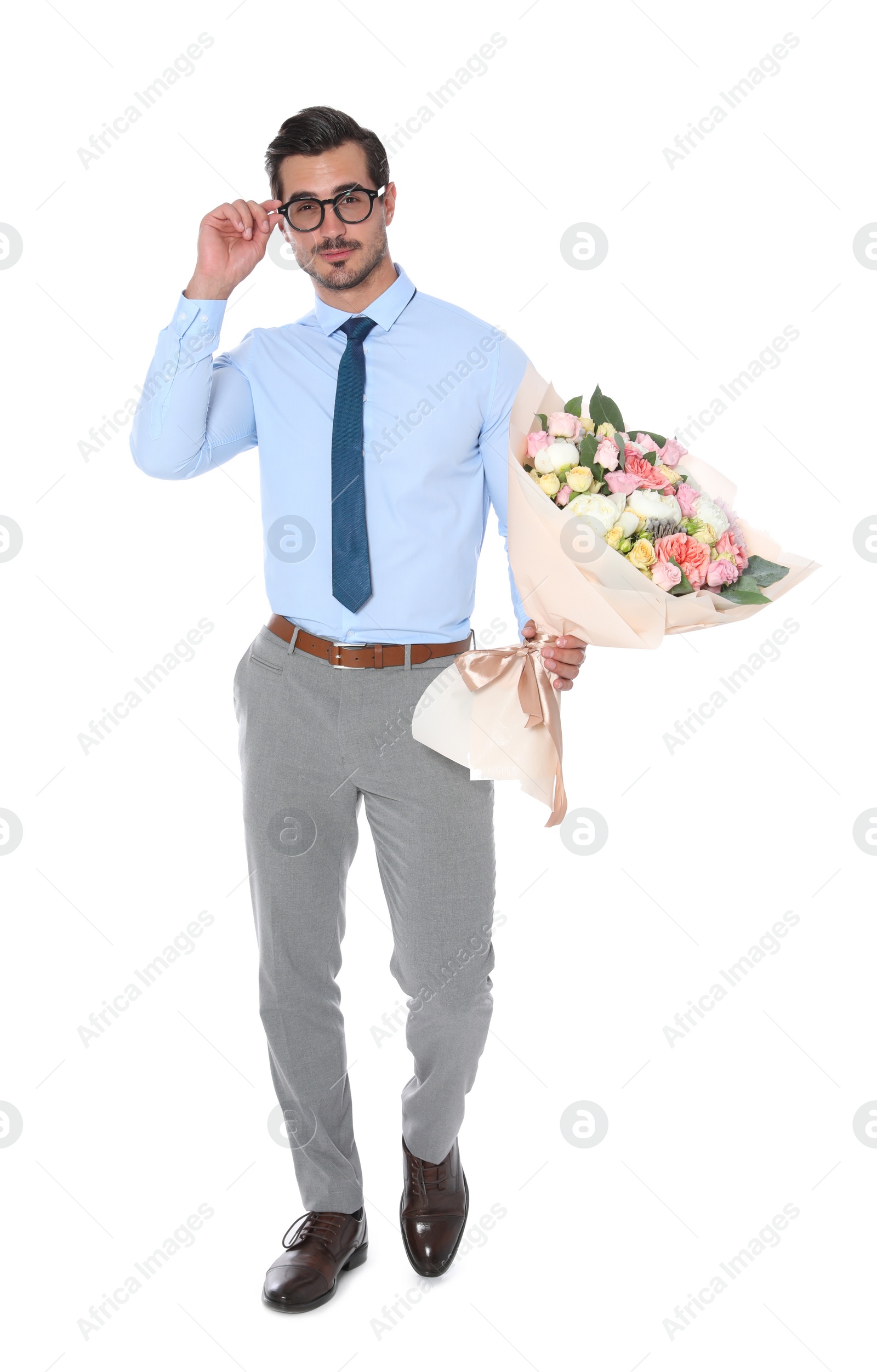 Photo of Young handsome man with beautiful flower bouquet on white background