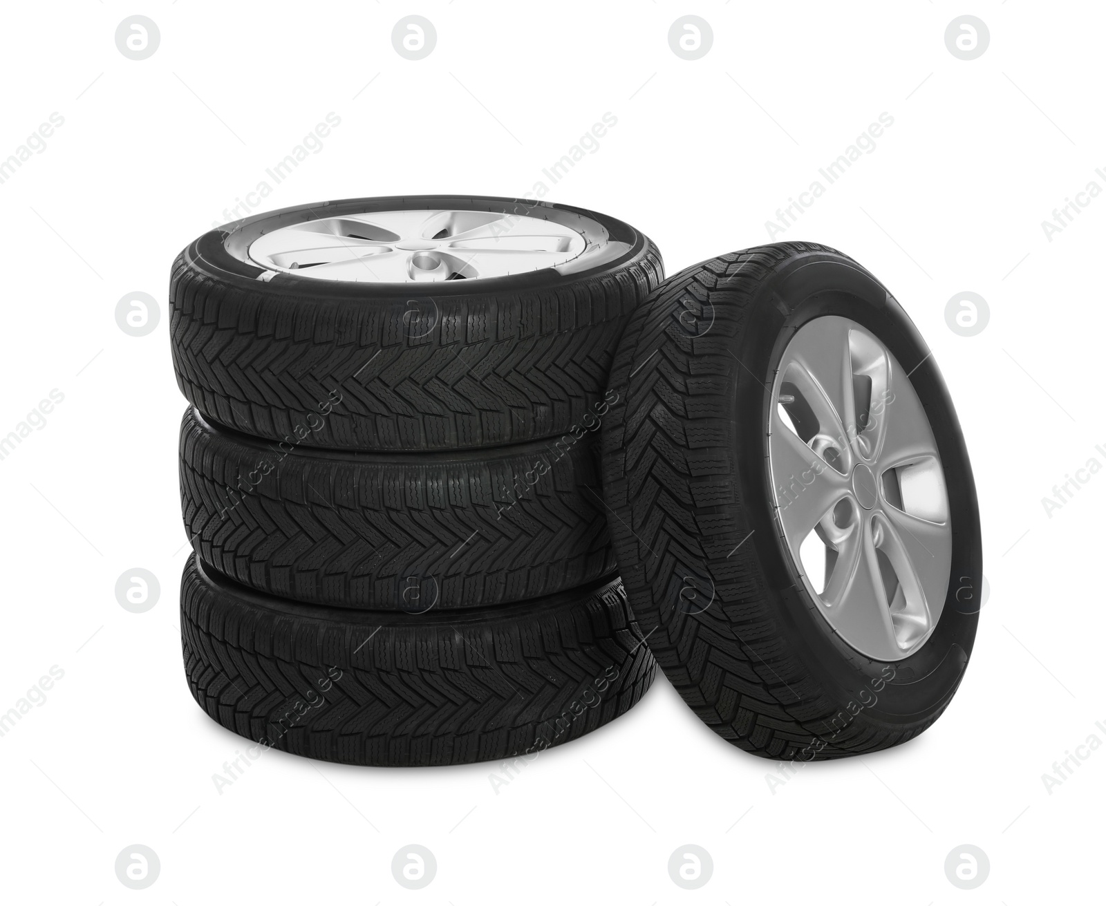 Photo of Set of wheels with winter tires on white background