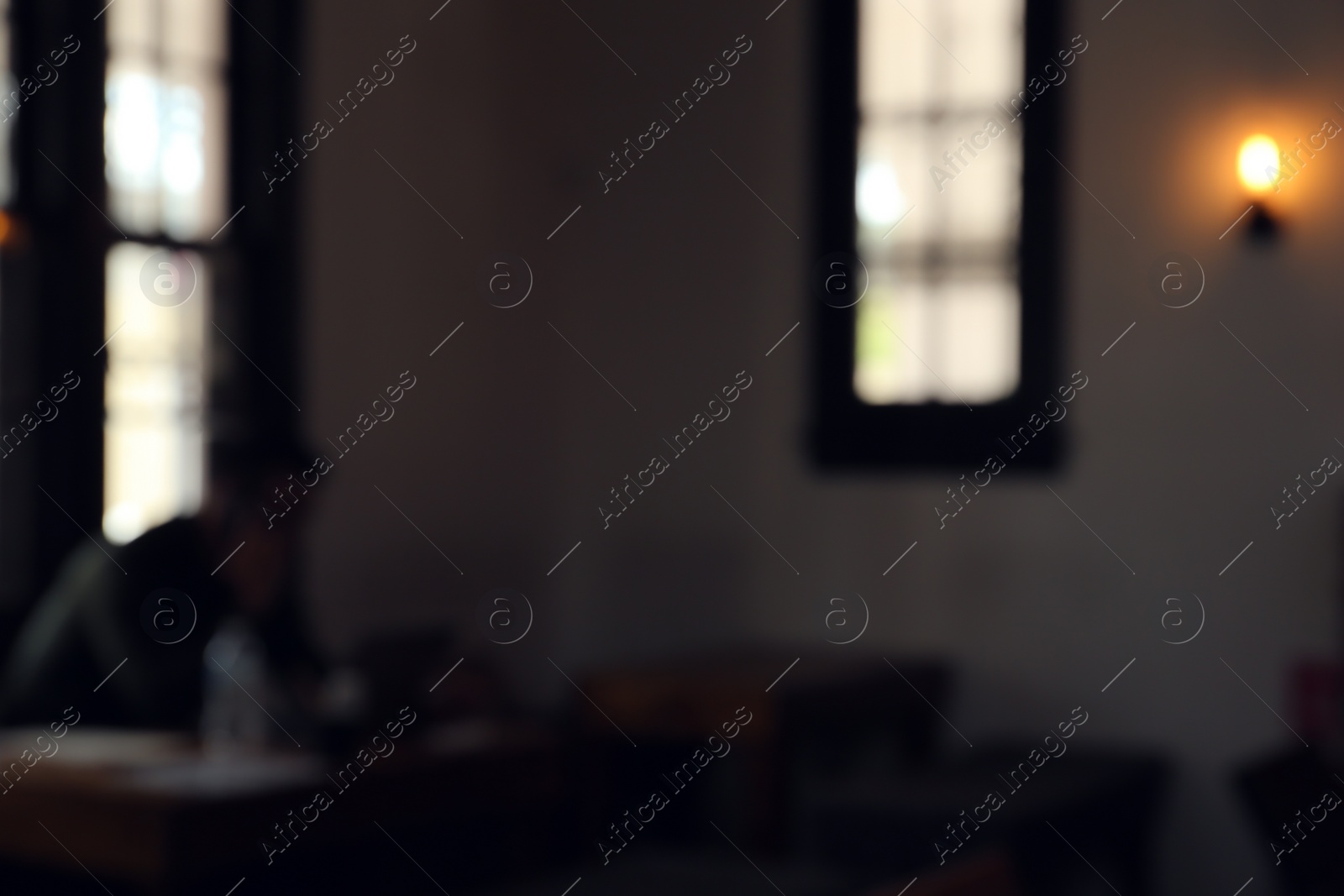 Photo of Blurred view of beautiful cozy cafe interior