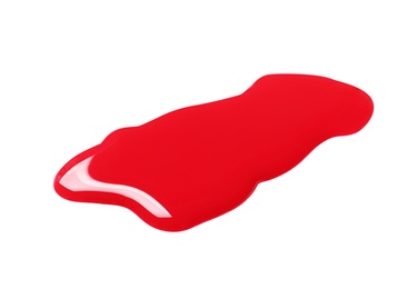 Photo of Red nail polish stain on white background