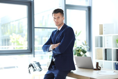 Photo of Portrait of male business trainer in office wear at workplace