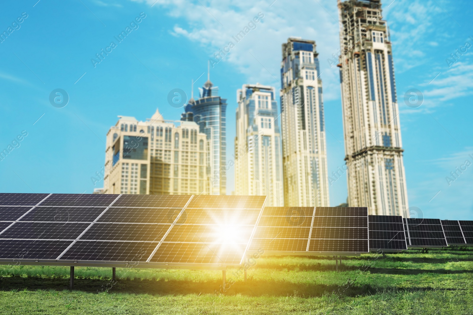 Image of Cityscape and solar panels installed outdoors. Alternative energy source