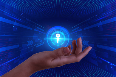 Image of Concept of keywords research and modern technology. Woman demonstrating digital key on blue background, closeup