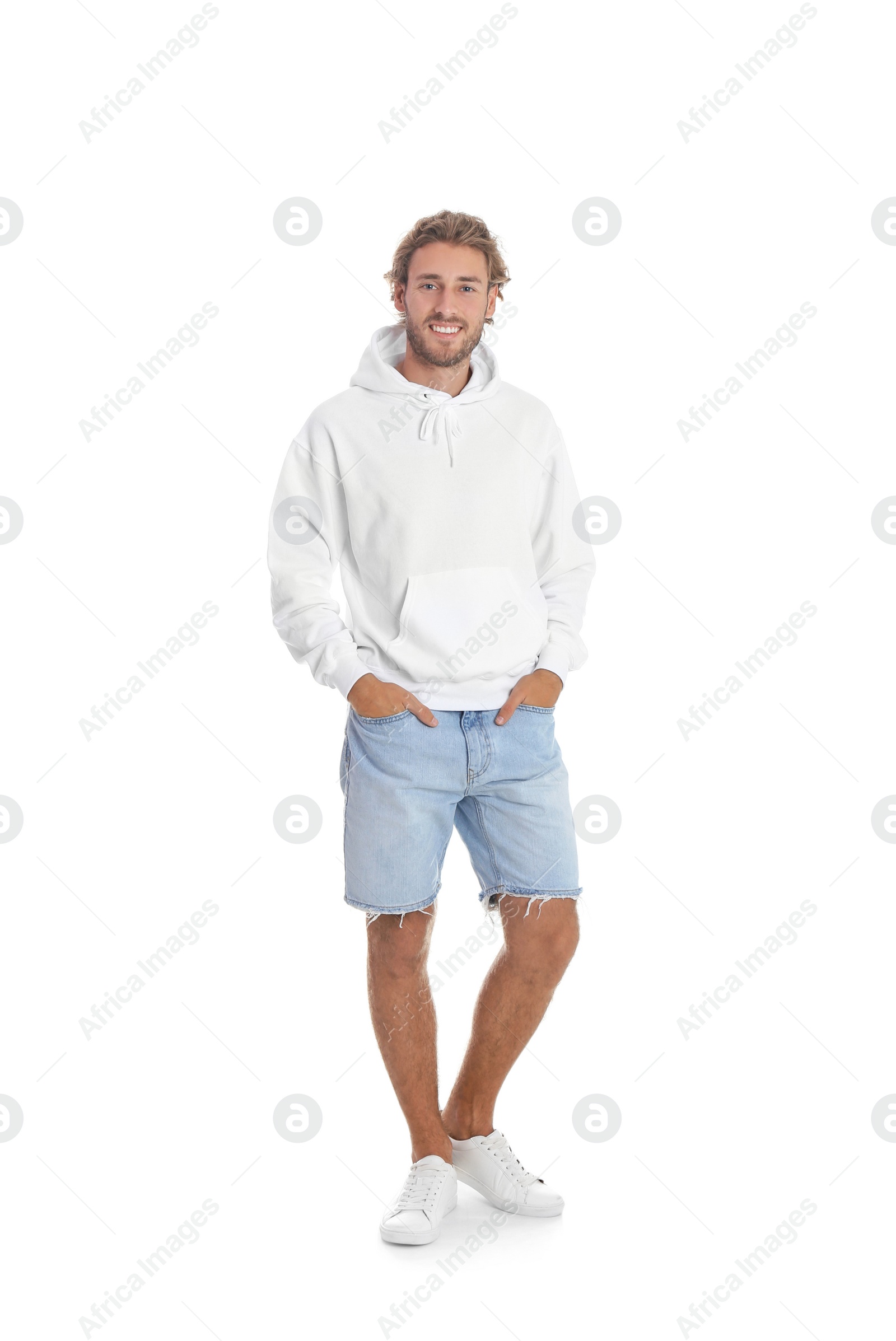 Photo of Full length portrait of man in hoodie sweater on white background. Space for design