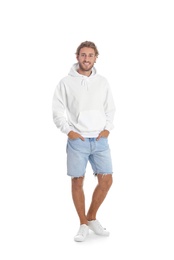 Photo of Full length portrait of man in hoodie sweater on white background. Space for design