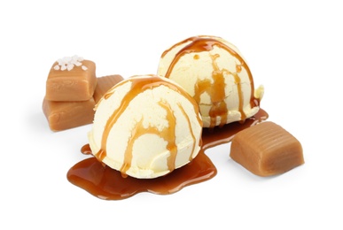 Photo of Delicious ice cream with salted caramel and sauce on white background