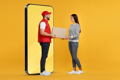 Image of Courier giving parcel to woman near huge smartphone on orange background. Delivery service