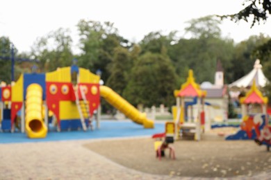 Blurred view of children's playground on autumn day