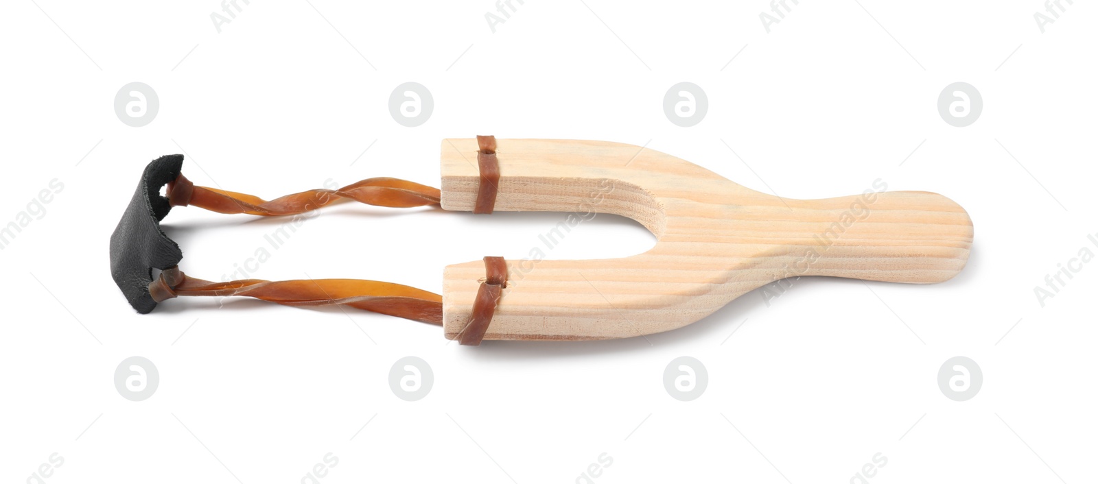 Photo of One wooden slingshot with leather pouch isolated on white