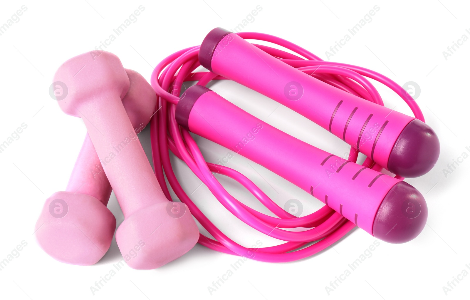 Photo of Dumbbells and skipping rope isolated on white, above view