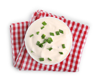 Photo of Fresh sour cream with onion and fabric on white background, top view