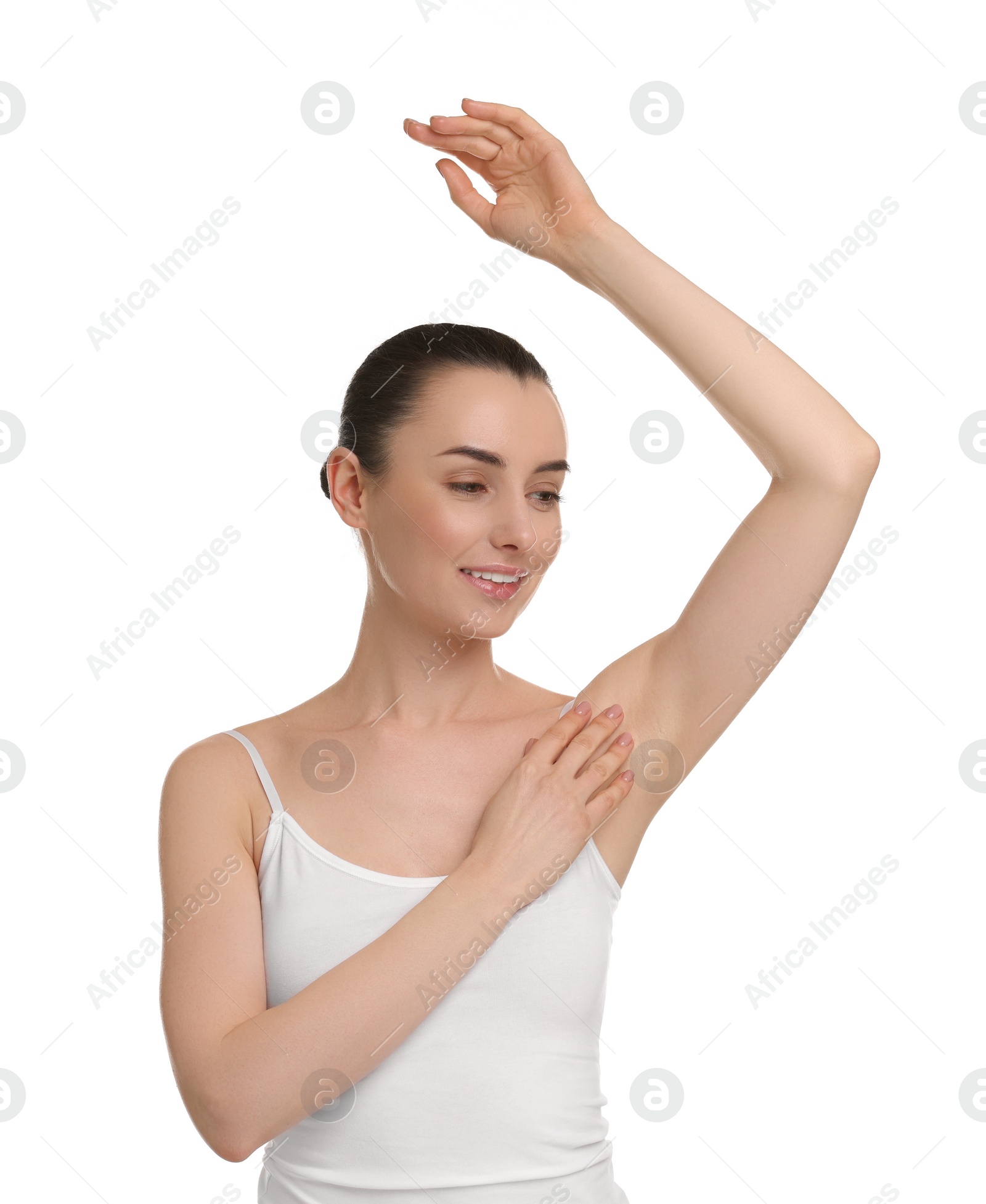 Photo of Beautiful woman showing armpit with smooth clean skin on white background