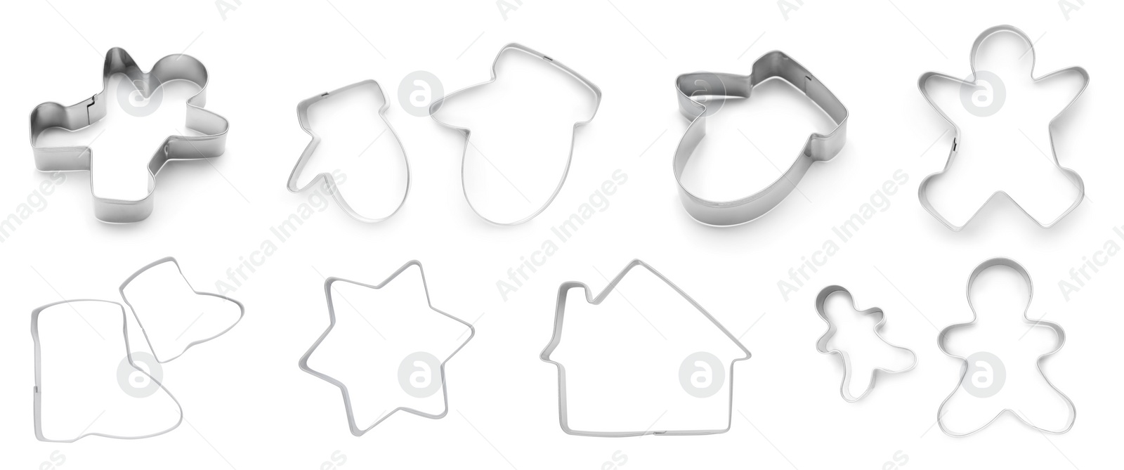 Image of Set with cookie cutters of different shapes on white background. Banner design
