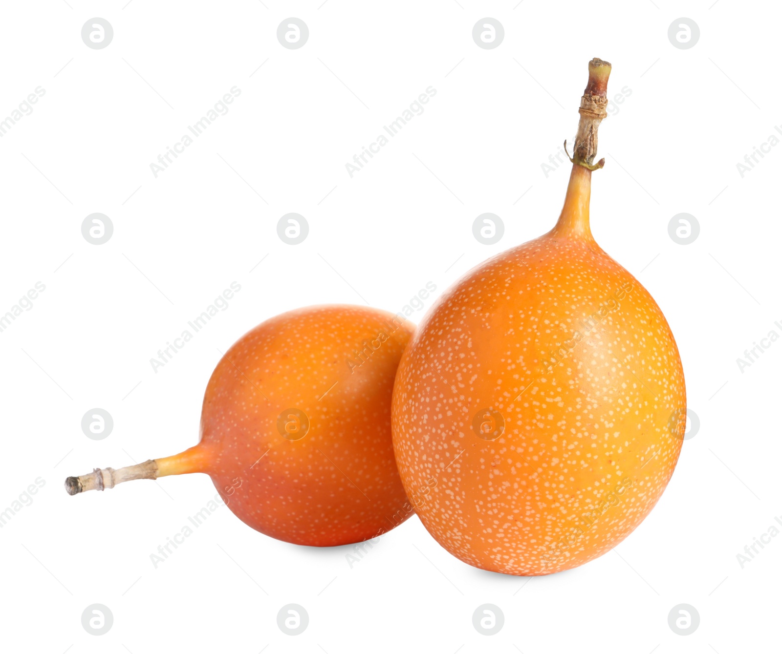 Photo of Whole delicious ripe granadillas on white background