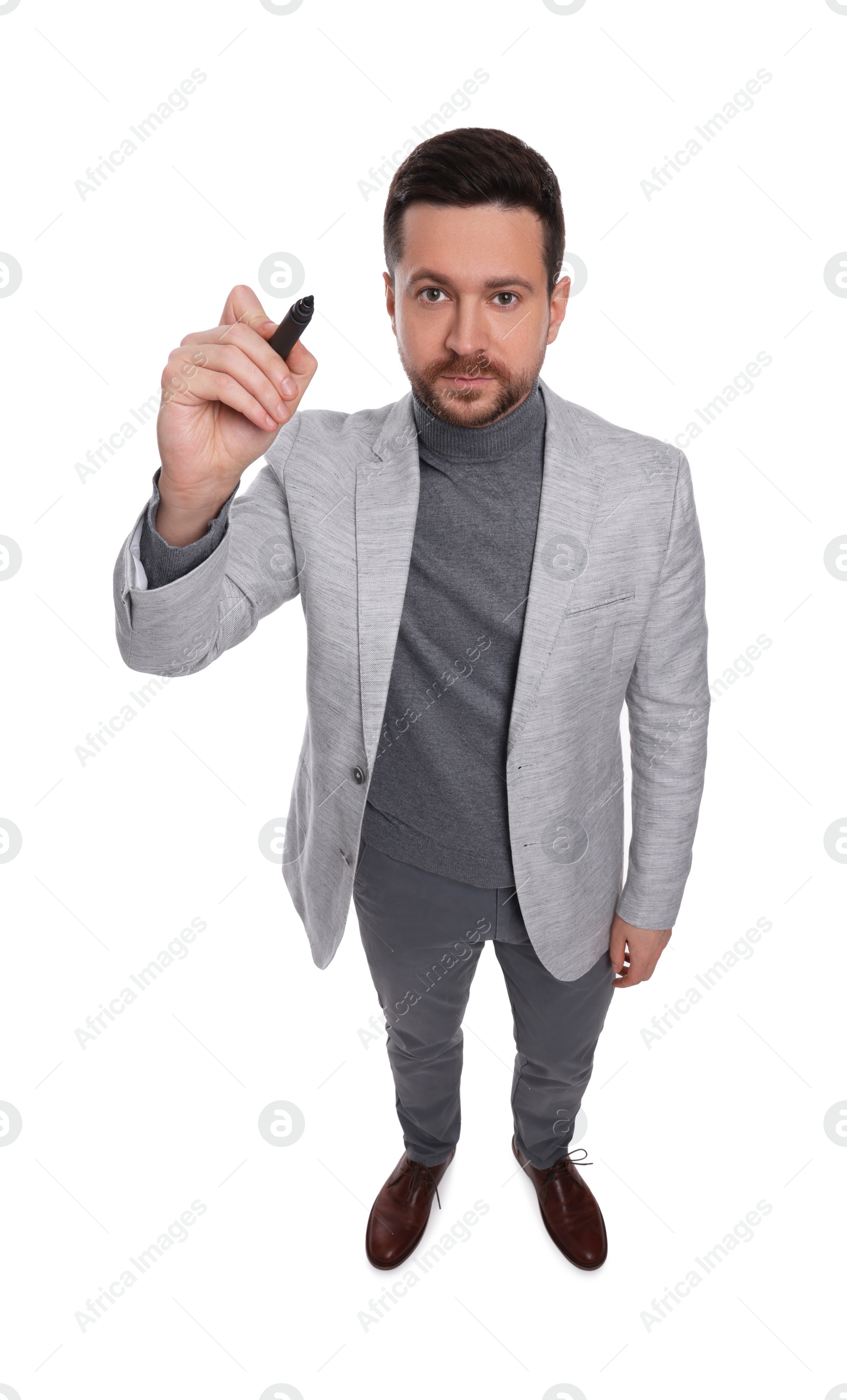 Photo of Handsome bearded businessman with marker on white background, above view