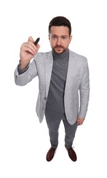 Photo of Handsome bearded businessman with marker on white background, above view