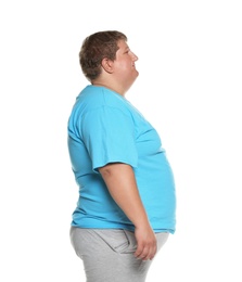 Photo of Portrait of overweight man posing on white background