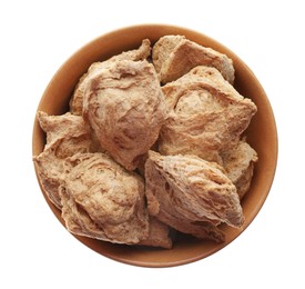 Dehydrated soy meat chunks in bowl on white background, top view