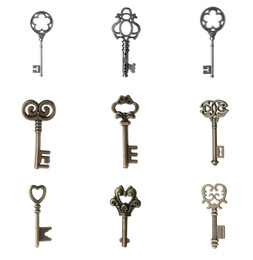 Image of Set of different ornate keys on white background