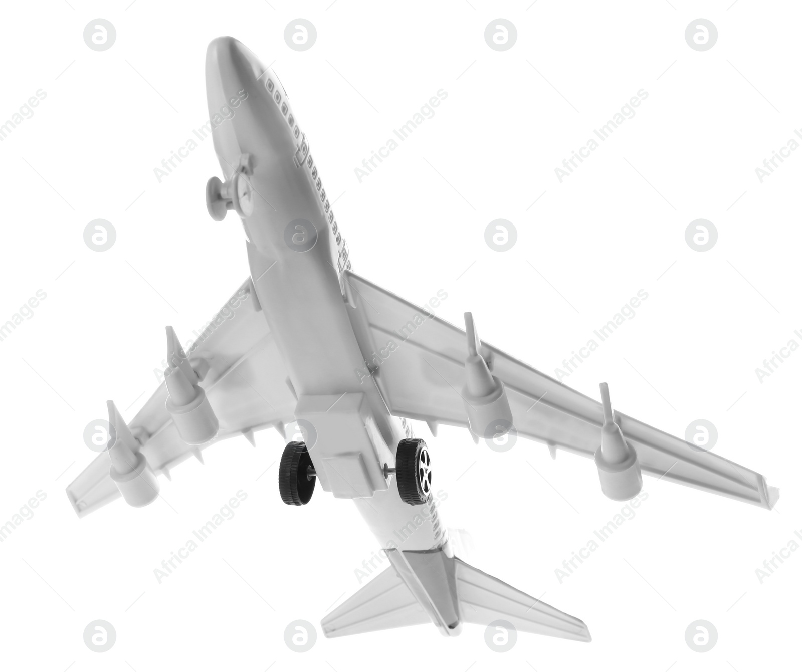 Photo of Toy airplane isolated on white. Travel concept