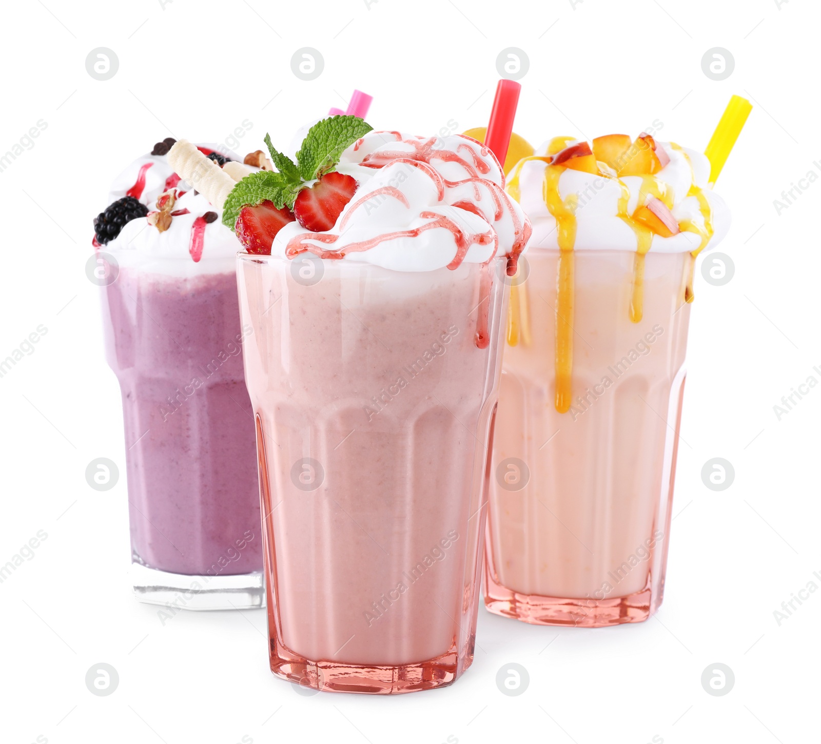 Photo of Different tasty milk shakes in glasses on white background