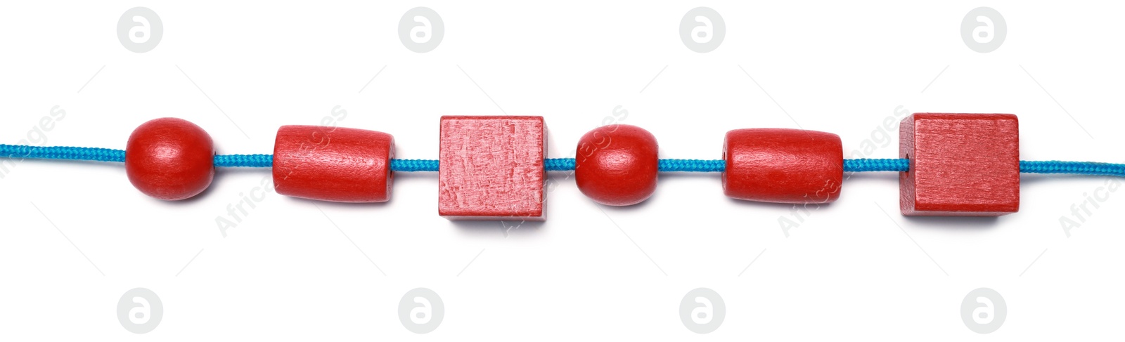 Photo of Wooden pieces and string for threading activity isolated on white, top view. Educational toy for motor skills development