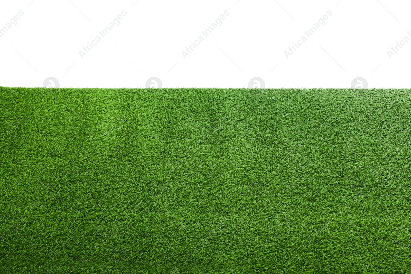 Photo of Green artificial grass surface isolated on white