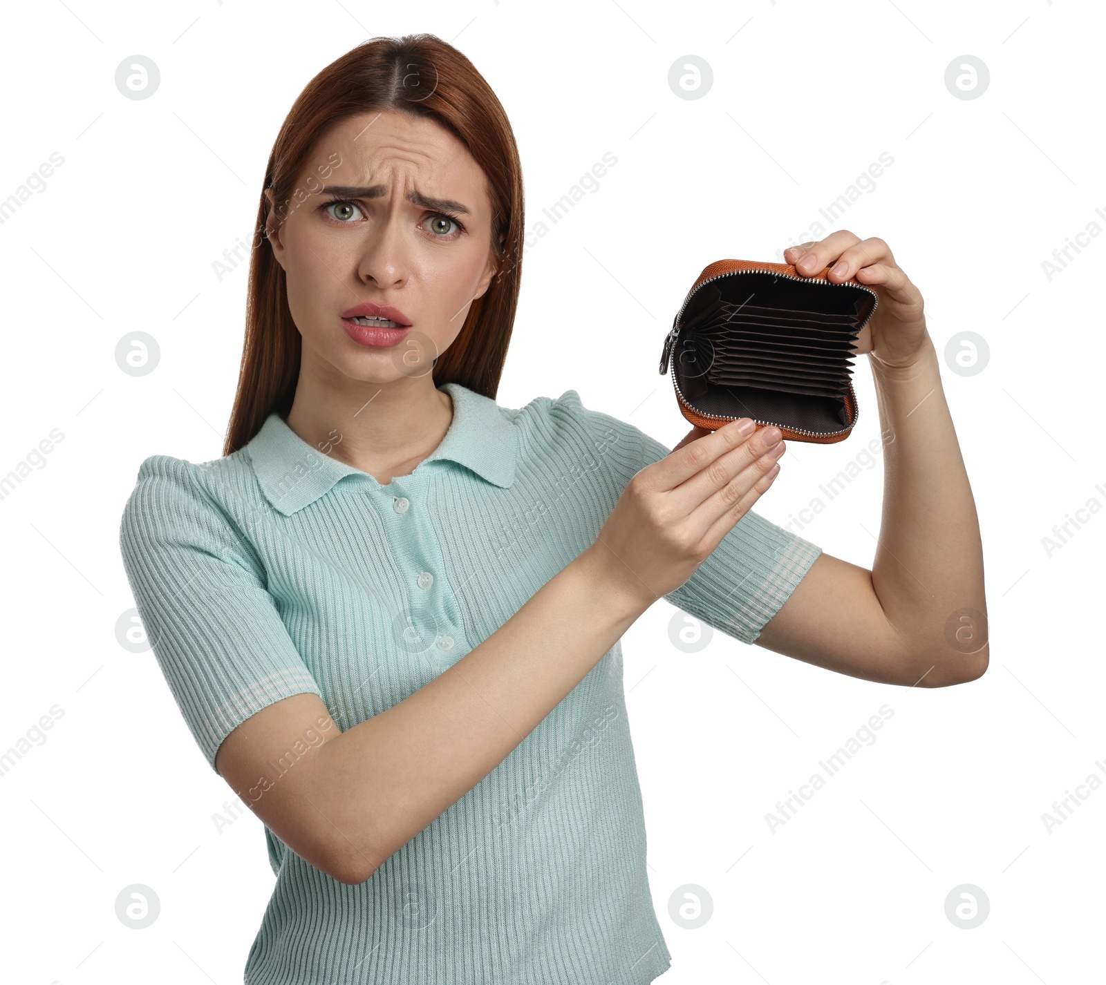 Photo of Confused woman with empty wallet on white background