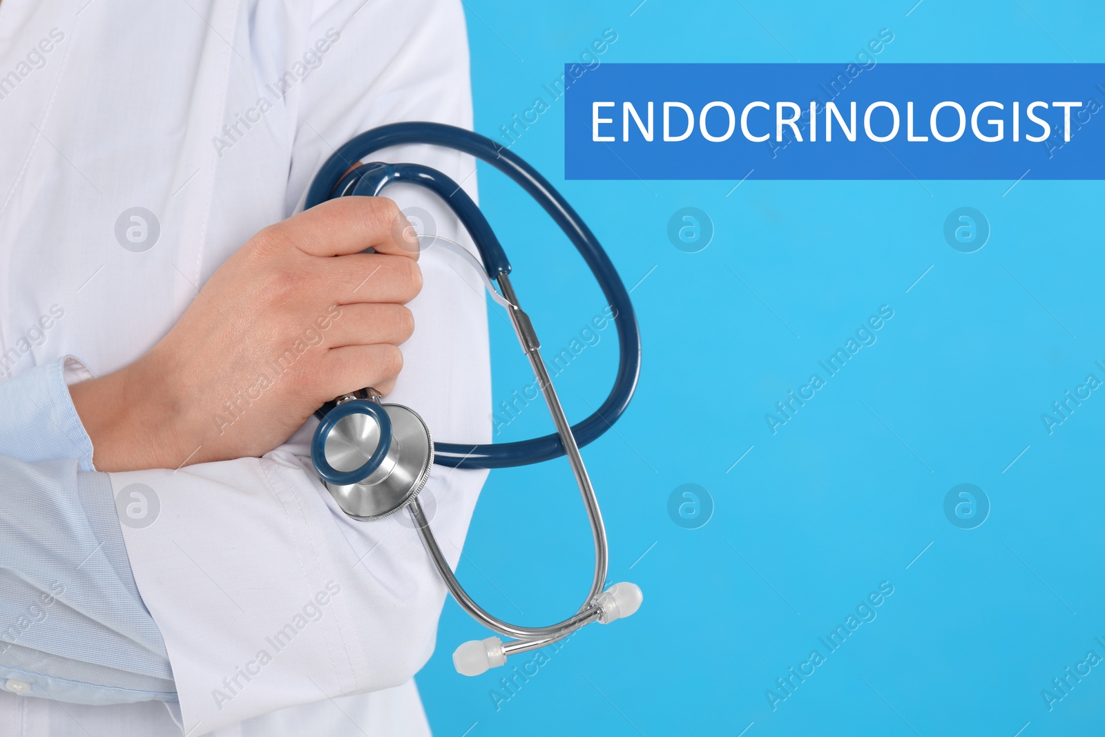 Image of Endocrinologist with stethoscope on light blue background, closeup