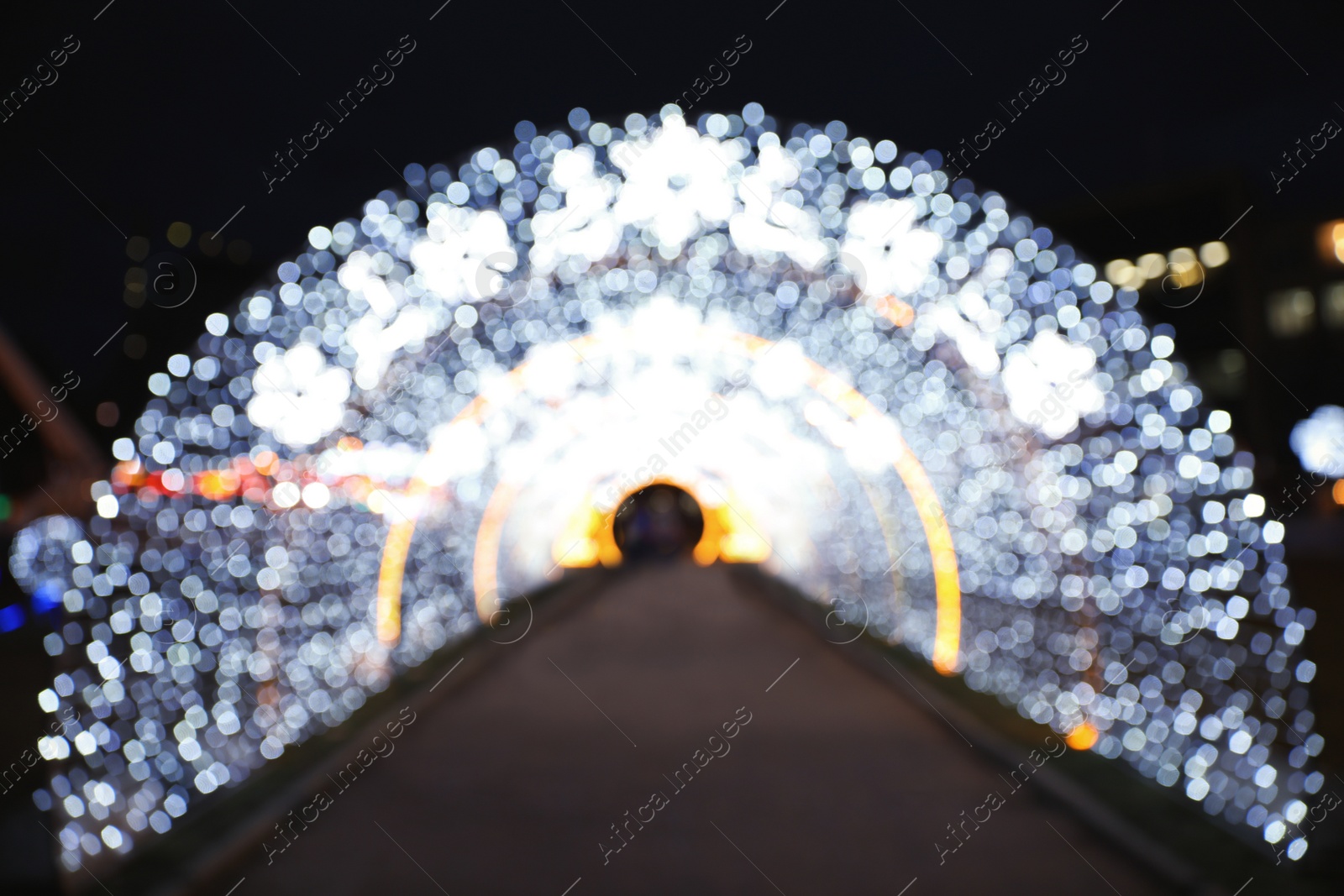 Photo of Beautiful street lights at night. Bokeh effect