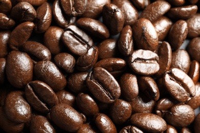 Photo of Roasted coffee beans as background, top view