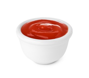 Photo of Bowl of tasty ketchup isolated on white. Tomato sauce