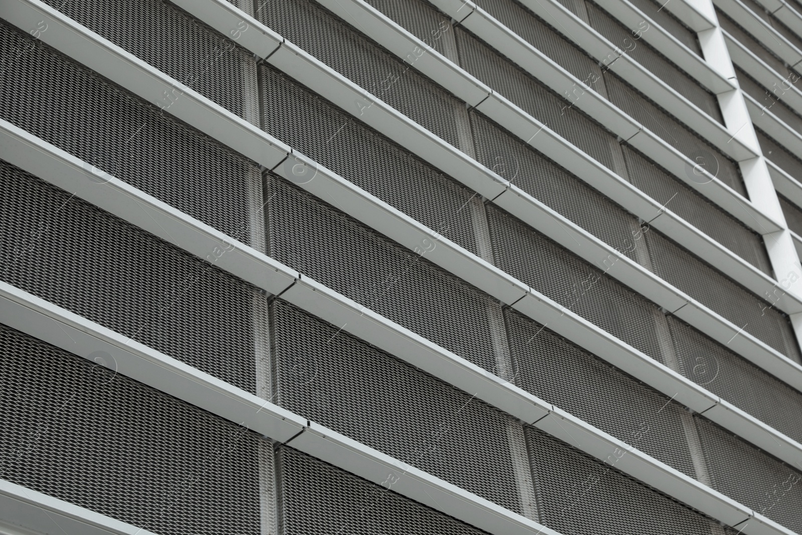 Photo of Modern building, low angle view. Urban architecture