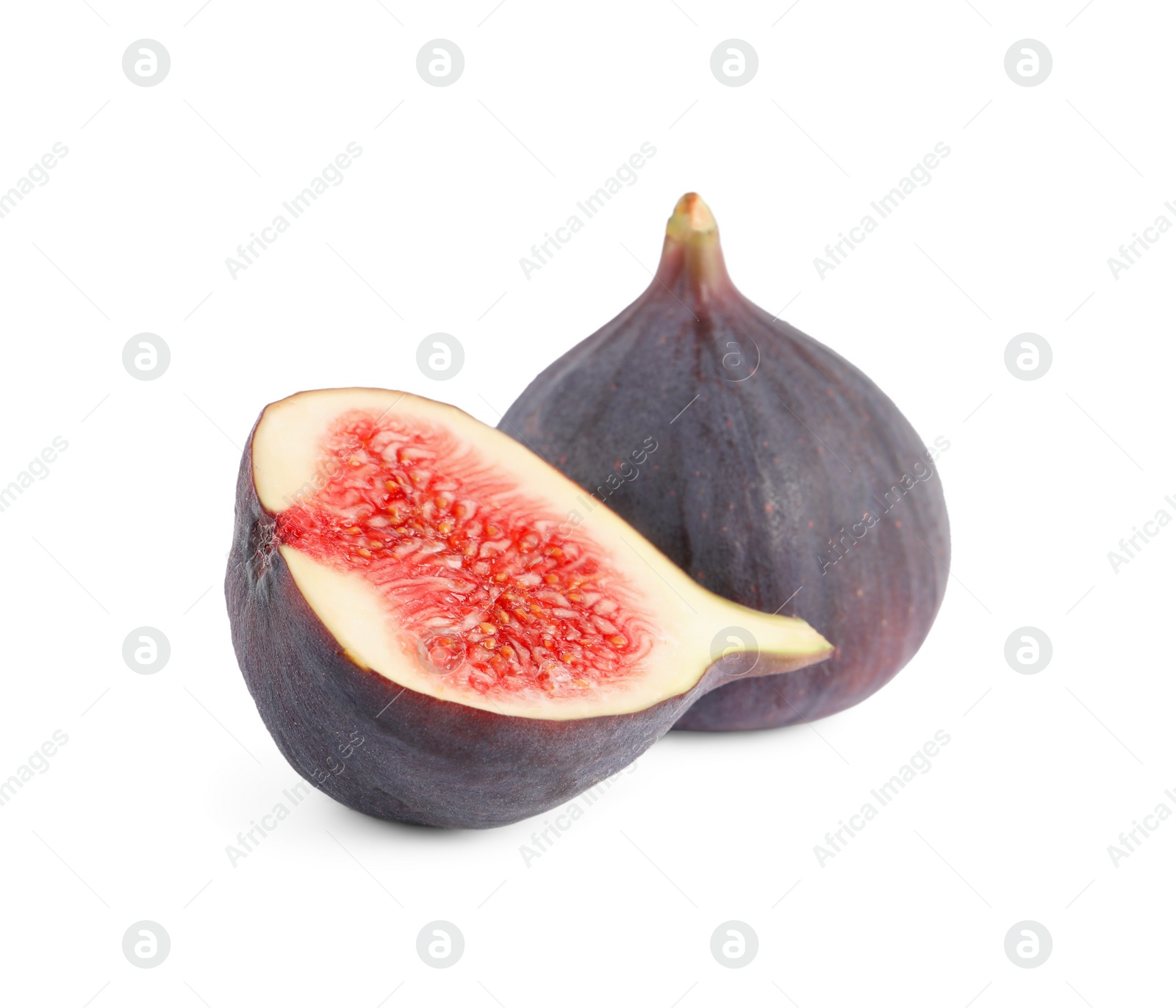 Photo of Whole and cut ripe figs isolated on white