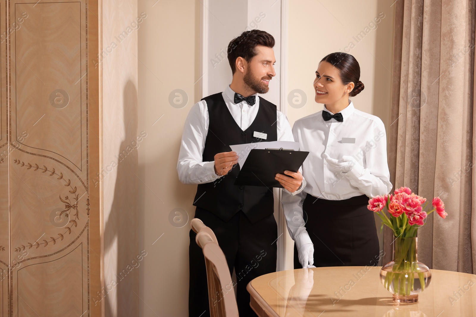 Photo of People attending professional butler courses in hotel