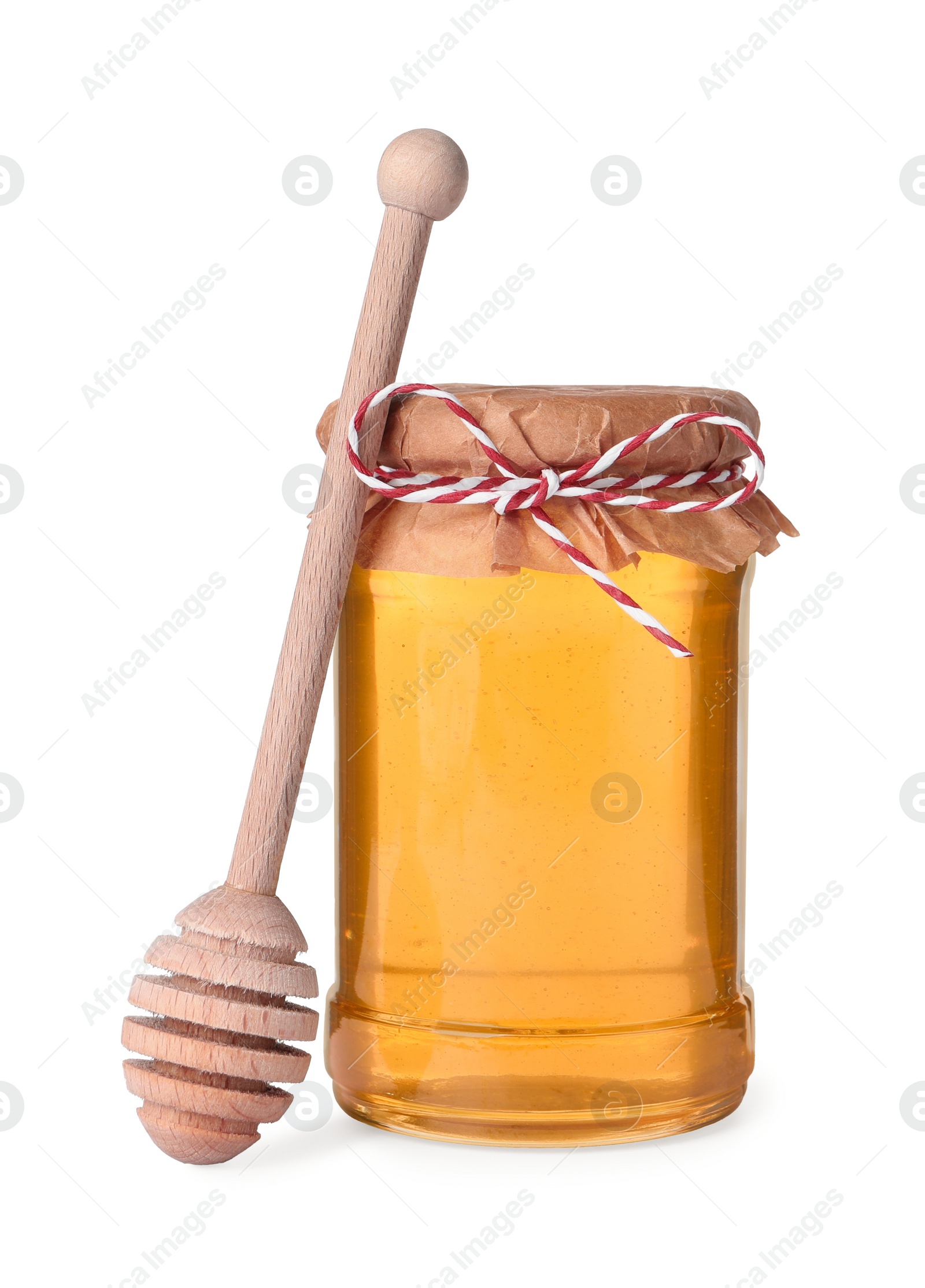 Photo of Tasty honey in glass jar and dipper isolated on white