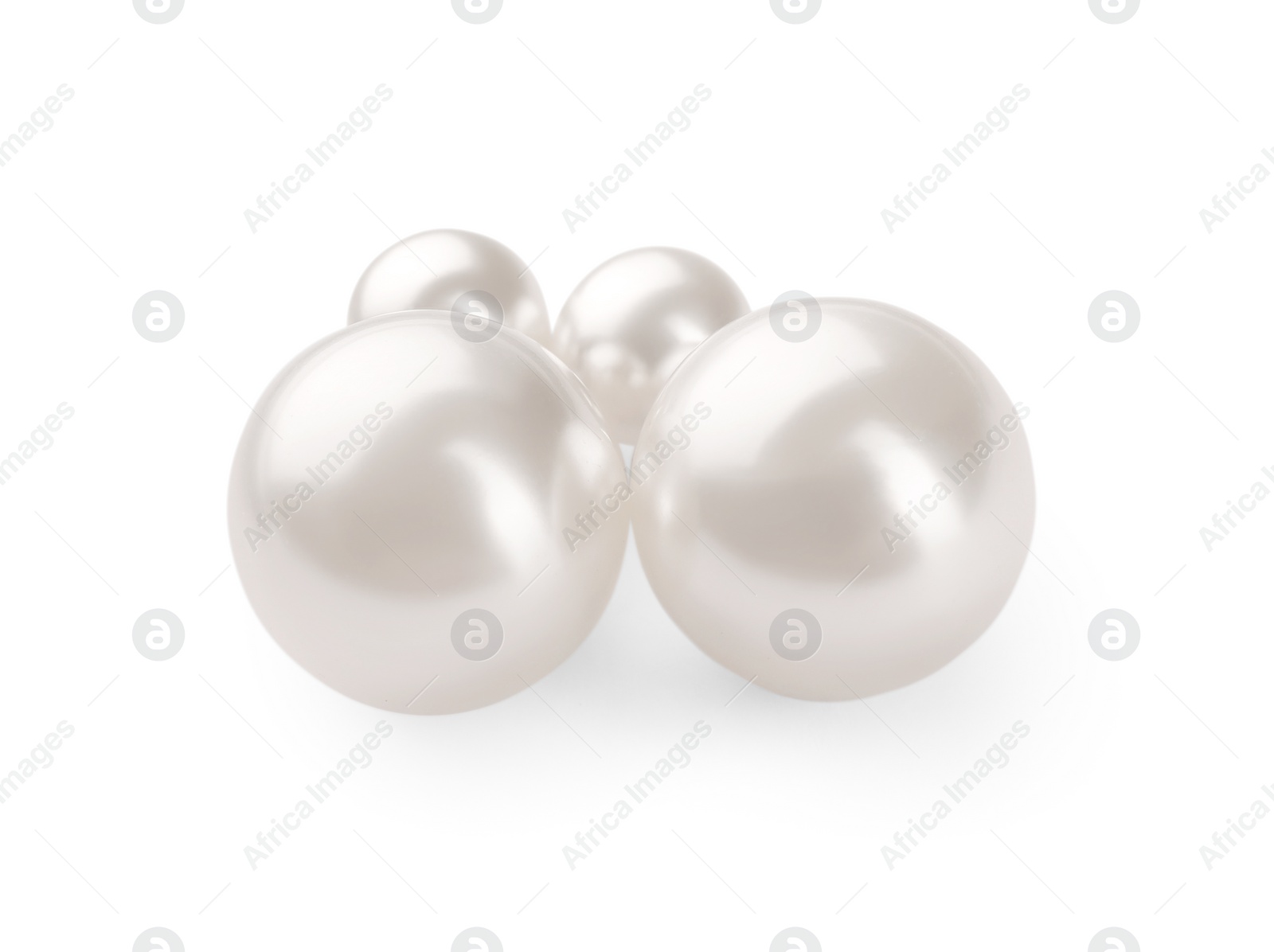 Photo of Elegant earrings with pearls isolated on white