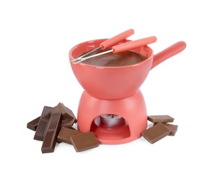 Photo of Fondue pot with melted chocolate, pieces of chocolate bar and forks isolated on white
