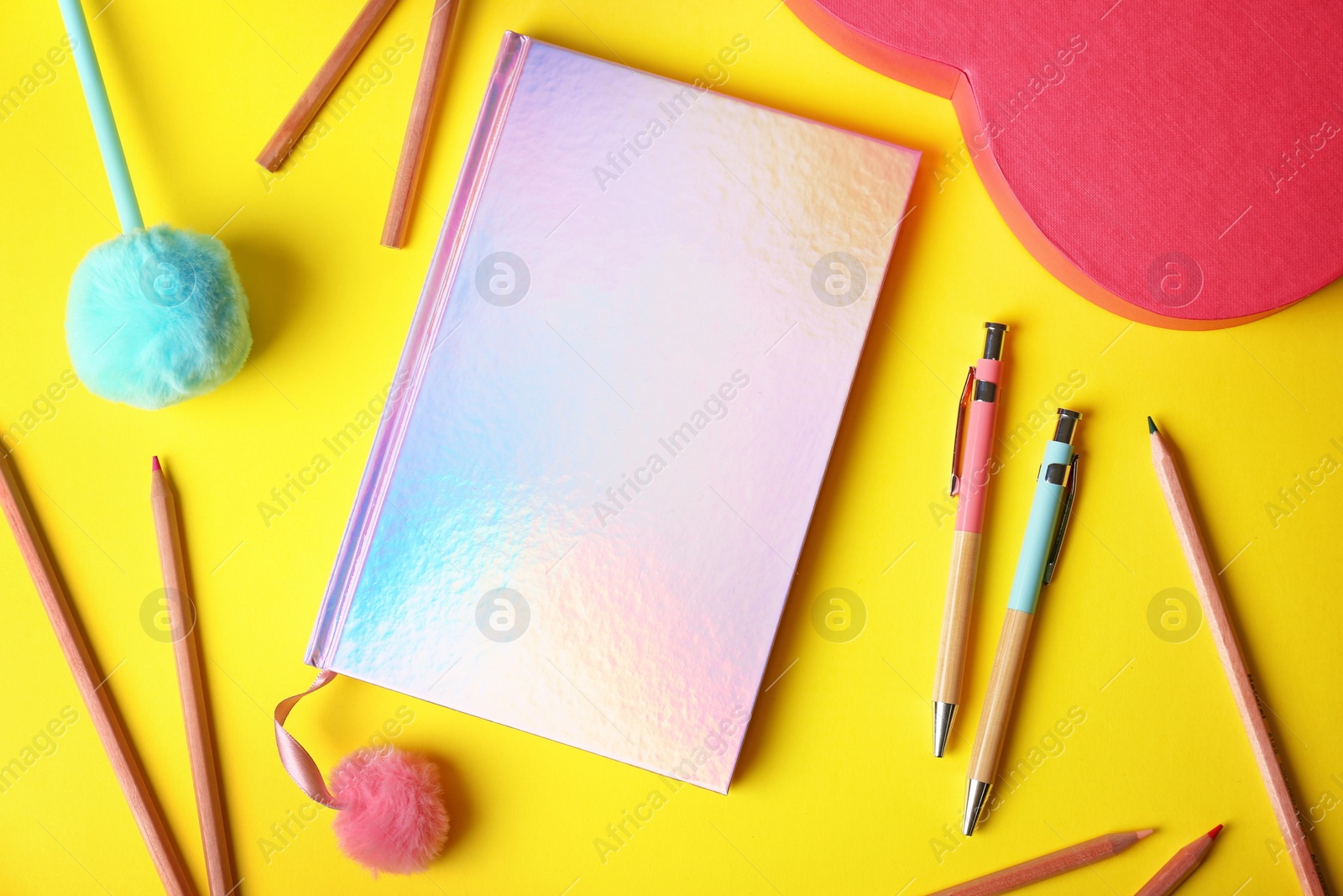 Photo of Flat lay composition with stylish female notebook and stationery on color background