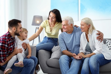 Photo of Happy family at home. Reunion of generations