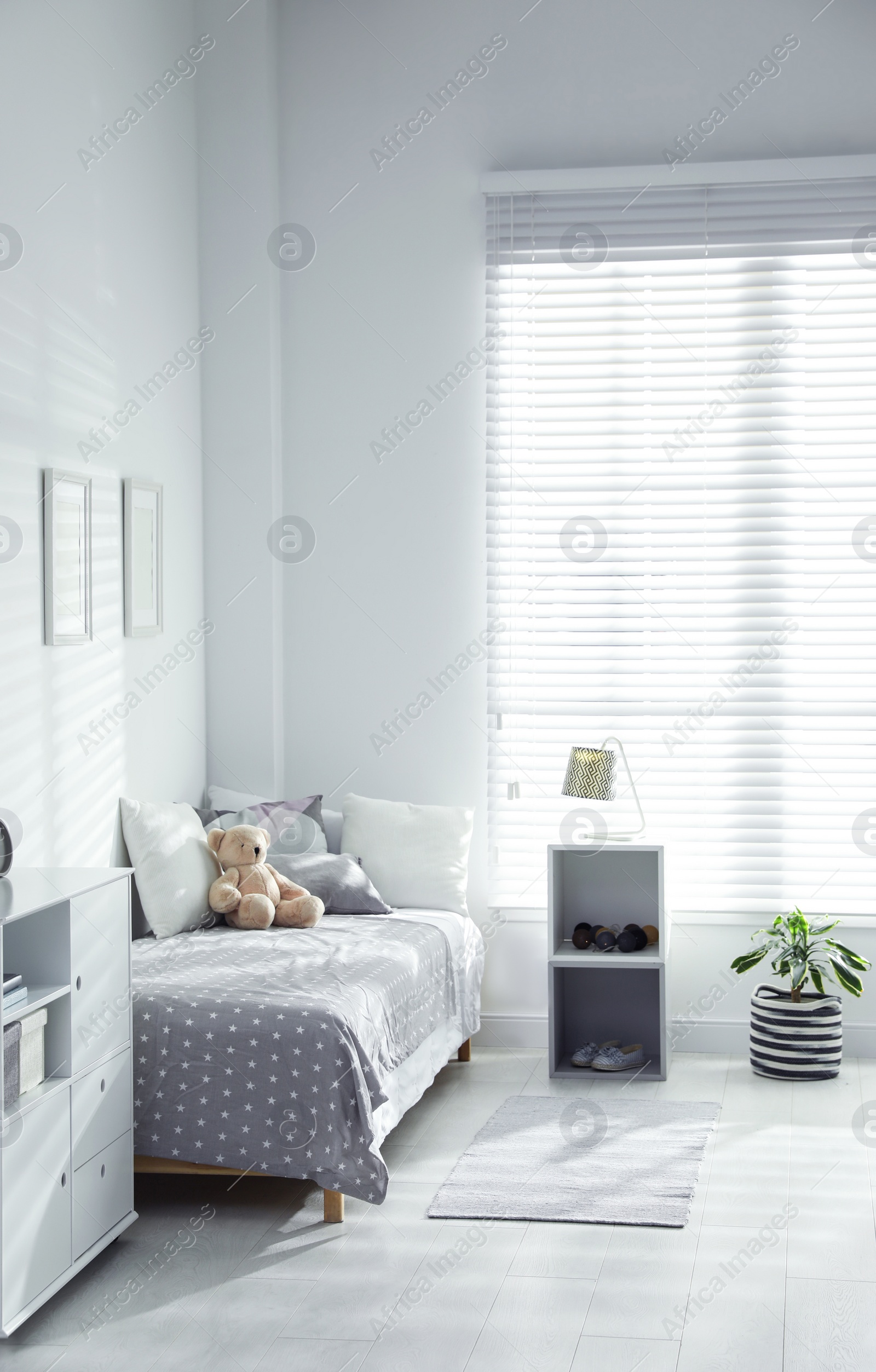 Photo of Modern child room interior with comfortable bed