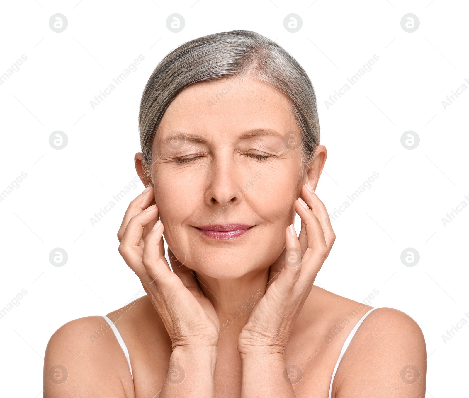 Photo of Portrait of senior woman with aging skin on white background. Rejuvenation treatment