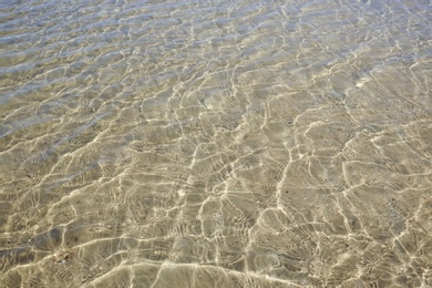 Surface of pure sea water on sunny day