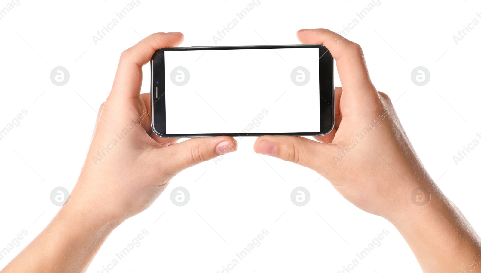 Photo of Man holding smartphone with blank screen on white background, closeup of hands. Space for text