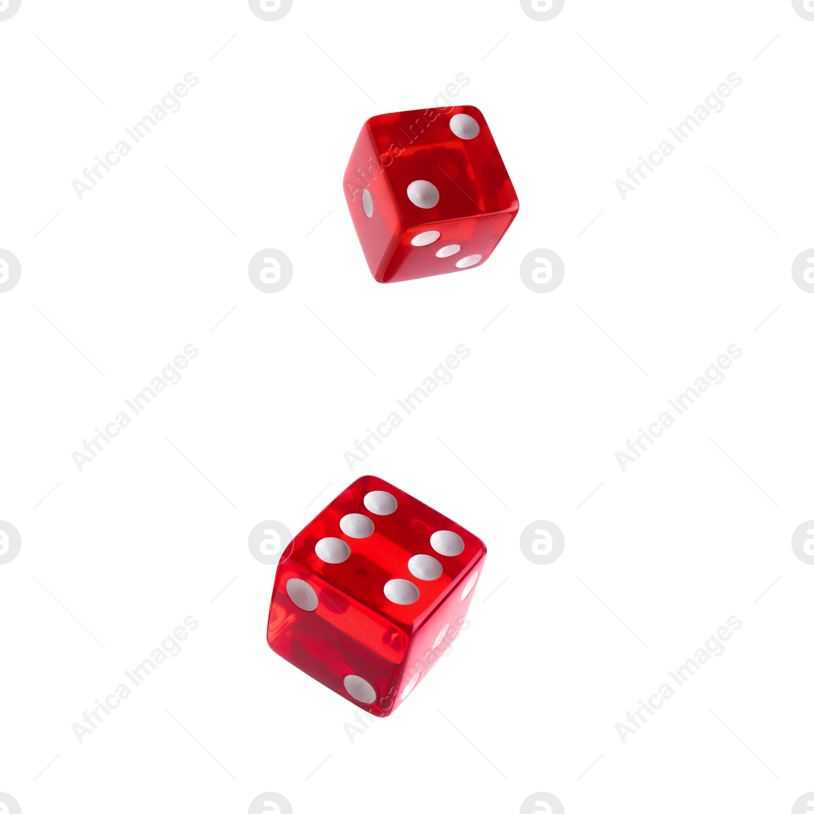 Image of Two red dice in air on white background